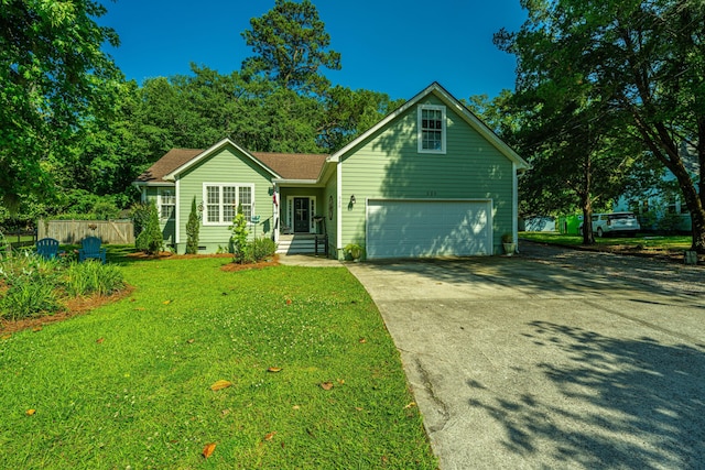 view of front of house with a garage and a front yard