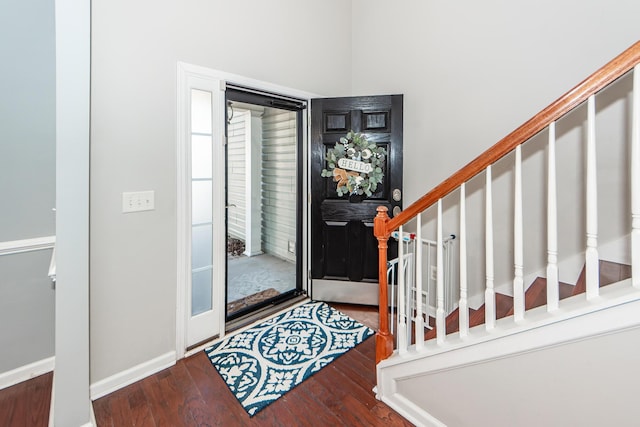 foyer featuring dark hardwood / wood-style floors