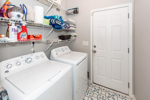 laundry area featuring independent washer and dryer