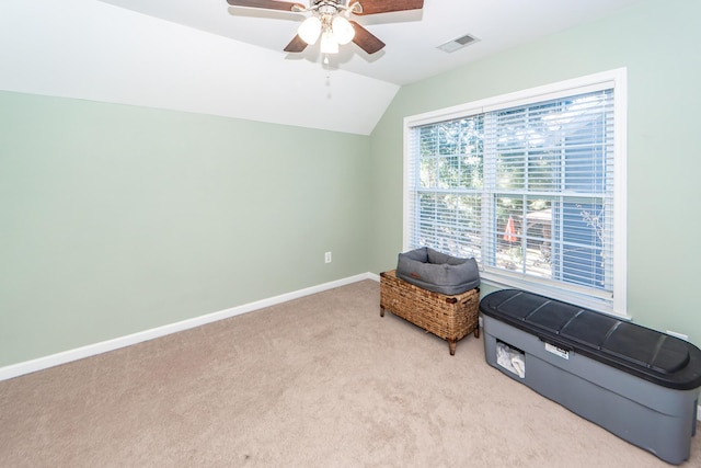 sitting room featuring light colored carpet, ceiling fan, and lofted ceiling