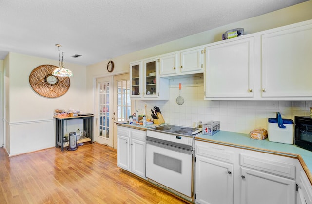 4 Garth Dr, Charleston, SC 29414 - kitchen featuring white range with electric cooktop, white cabinetry, and backsplash