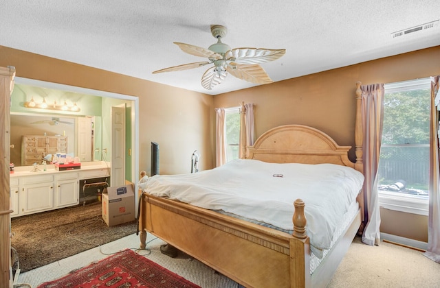 4 Garth Dr, Charleston, SC 29414 - bedroom featuring carpet floors, multiple windows, a textured ceiling, and ceiling fan