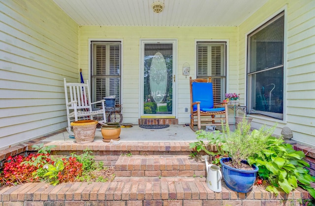 4 Garth Dr, Charleston, SC 29414 - doorway to property featuring covered porch