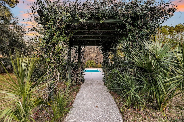 view of home's community featuring a pool