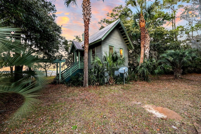 view of property exterior at dusk