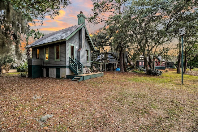 view of property exterior at dusk