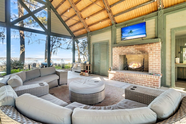 view of patio / terrace with an outdoor living space with a fireplace