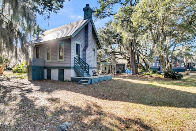 view of home's exterior featuring a yard