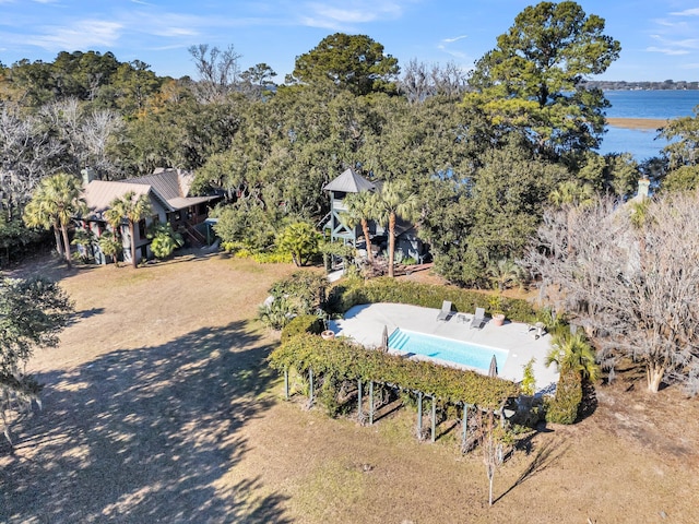 birds eye view of property with a water view