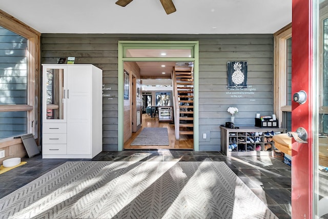 bedroom with wooden walls