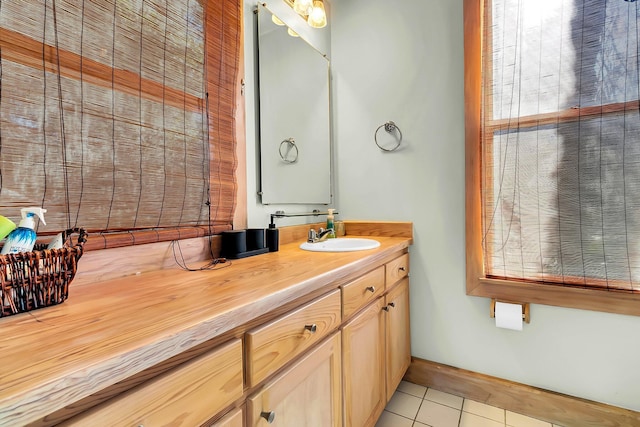 bathroom with vanity and tile patterned floors