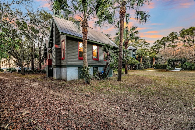 view of property exterior at dusk