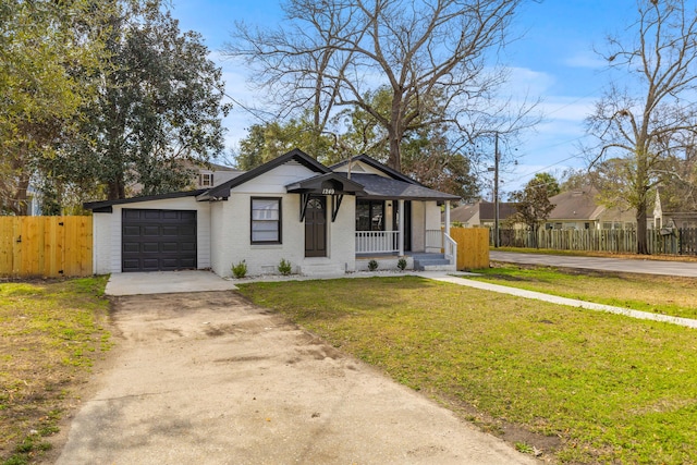 bungalow-style home featuring driveway, an attached garage, fence, a porch, and brick siding