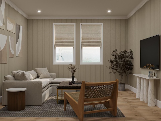 living room with light wood-type flooring and crown molding