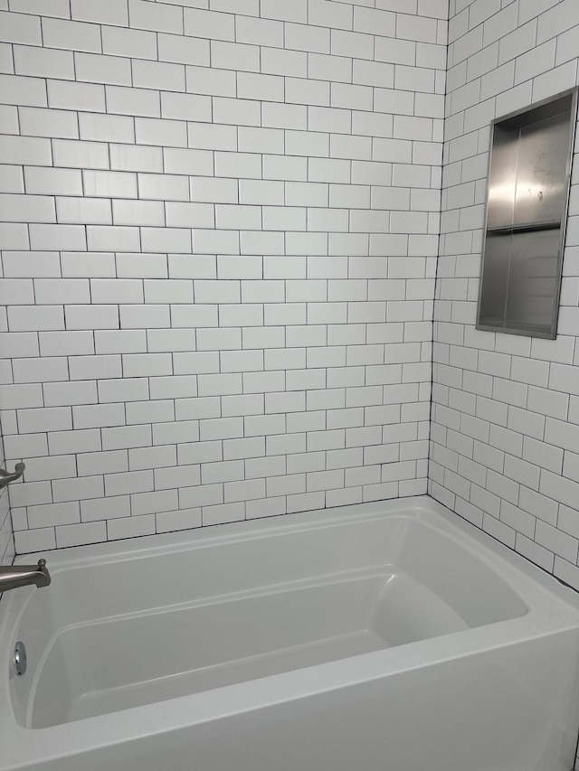 full bath featuring shower / bathtub combination