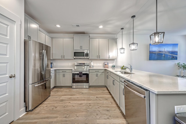 7803 Park Gate Dr, Charleston, SC 29418 - kitchen featuring gray cabinetry, visible vents, a sink, and appliances with stainless steel finishes