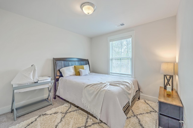 7803 Park Gate Dr, Charleston, SC 29418 - bedroom with baseboards, carpet floors, and visible vents