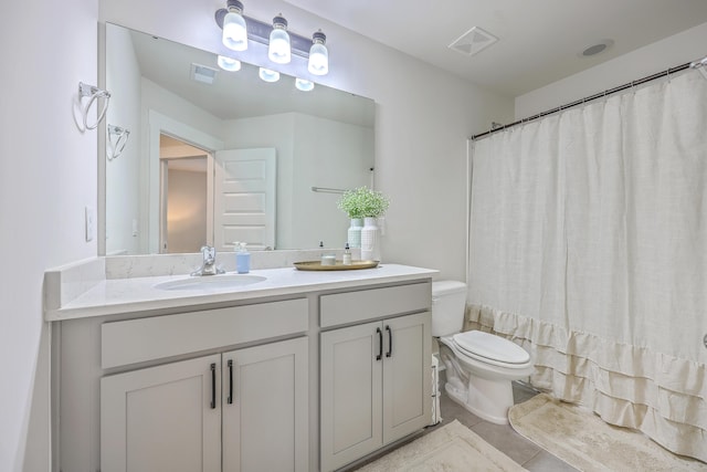 7803 Park Gate Dr, Charleston, SC 29418 - full bathroom with toilet, vanity, a shower with curtain, tile patterned flooring, and visible vents