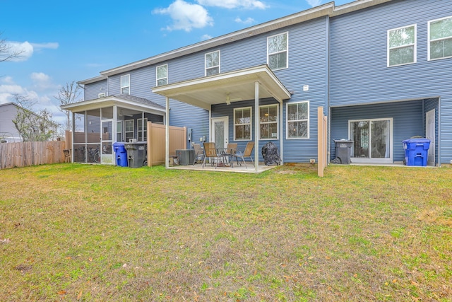 7803 Park Gate Dr, Charleston, SC 29418 - rear view of house with a lawn, fence, and a patio area