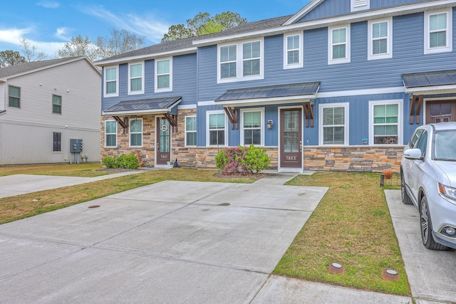 7803 Park Gate Dr, Charleston, SC 29418 - townhome / multi-family property featuring stone siding and a front yard