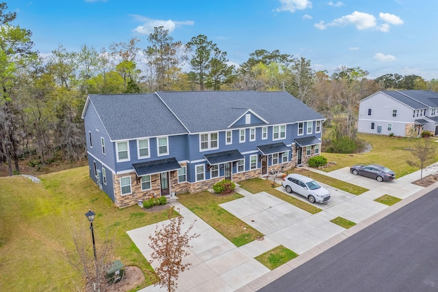 7803 Park Gate Dr, Charleston, SC 29418 - view of property featuring stone siding, a shingled roof, and a front lawn