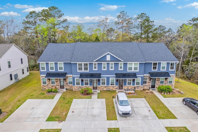 7803 Park Gate Dr, Charleston, SC 29418 - view of property featuring stone siding, a shingled roof, and a front yard