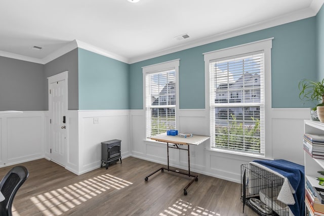 office with a healthy amount of sunlight, dark hardwood / wood-style flooring, and crown molding