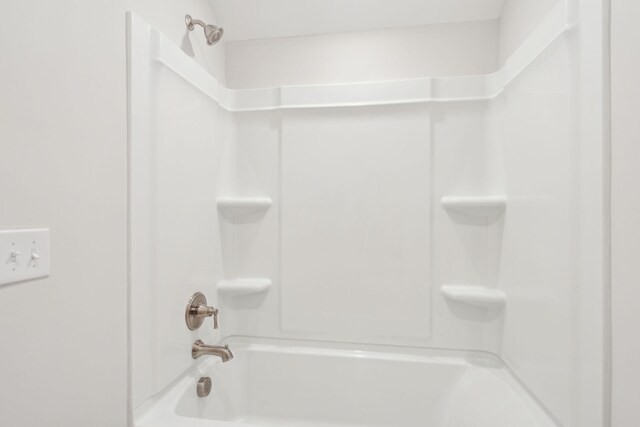 bathroom with shower / bathtub combination