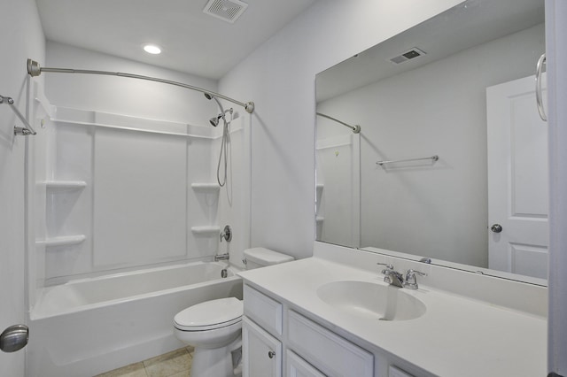 bathroom featuring vanity, toilet, visible vents, and tile patterned flooring