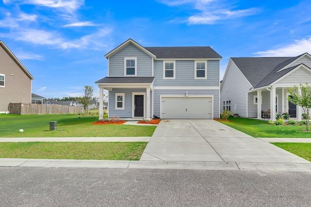 traditional-style home with fence, covered porch, concrete driveway, an attached garage, and a front yard