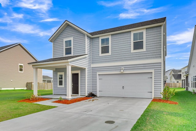 traditional-style house with driveway, a front lawn, a porch, fence, and an attached garage