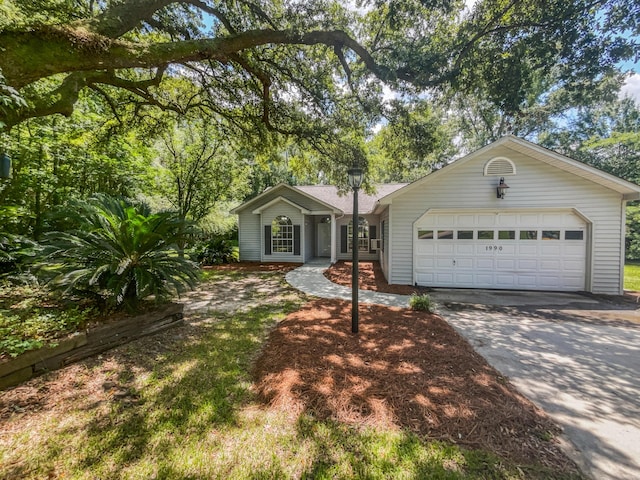 ranch-style house featuring a garage