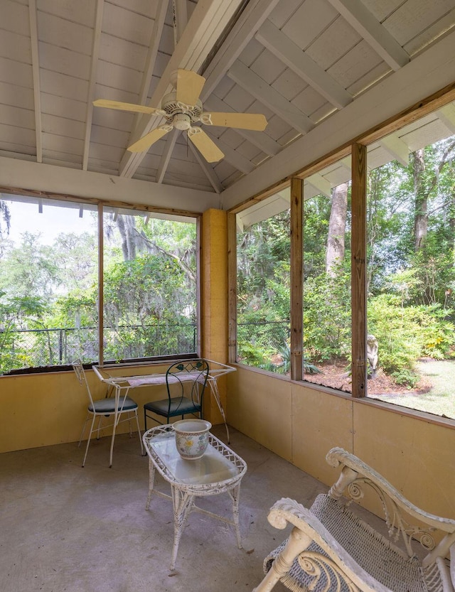 sunroom featuring ceiling fan