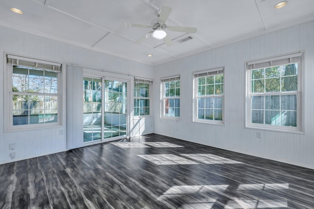 unfurnished room with ceiling fan and dark hardwood / wood-style flooring