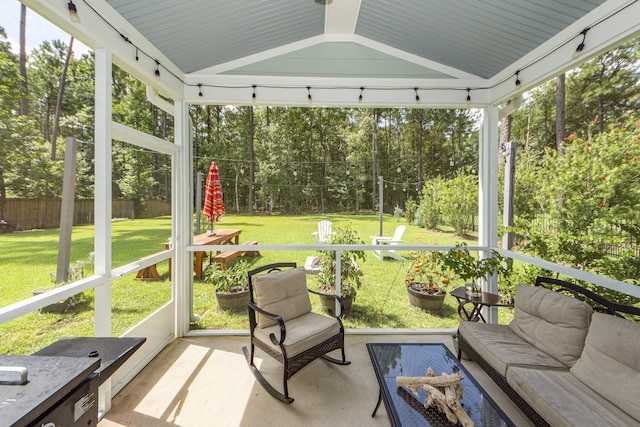 sunroom with lofted ceiling