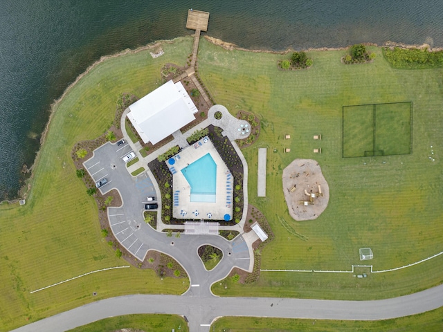 birds eye view of property featuring a water view