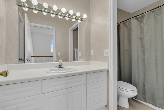 full bath featuring tile patterned floors, toilet, and vanity