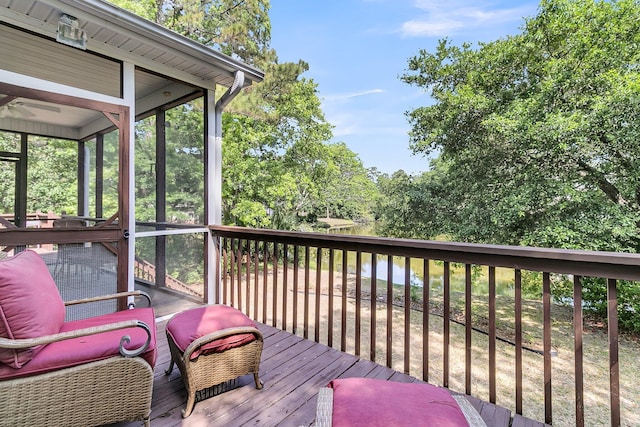 deck featuring a sunroom