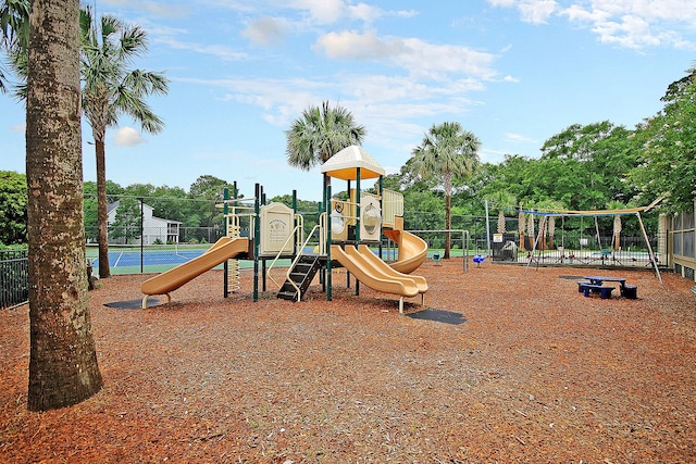 community jungle gym with fence
