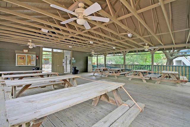 misc room featuring ceiling fan, vaulted ceiling, and healthy amount of natural light