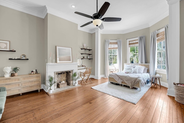 68 Vanderhorst St Unit A, Charleston, SC 29403 - bedroom with a fireplace, hardwood / wood-style floors, ornamental molding, recessed lighting, and ceiling fan