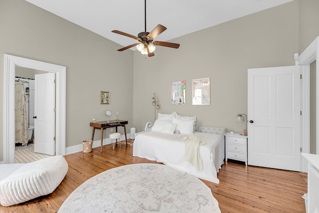 68 Vanderhorst St Unit A, Charleston, SC 29403 - bedroom with high vaulted ceiling, light wood-type flooring, and a ceiling fan