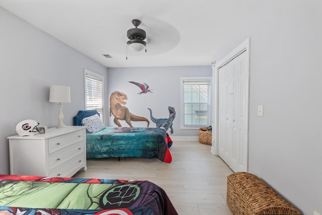 1250 White Tail Path, Charleston, SC 29414 - bedroom featuring a closet, light wood-style flooring, ceiling fan, and baseboards