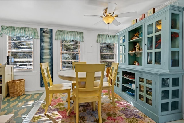 dining space featuring ceiling fan