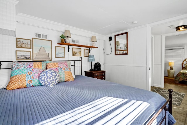 bedroom featuring tile patterned floors