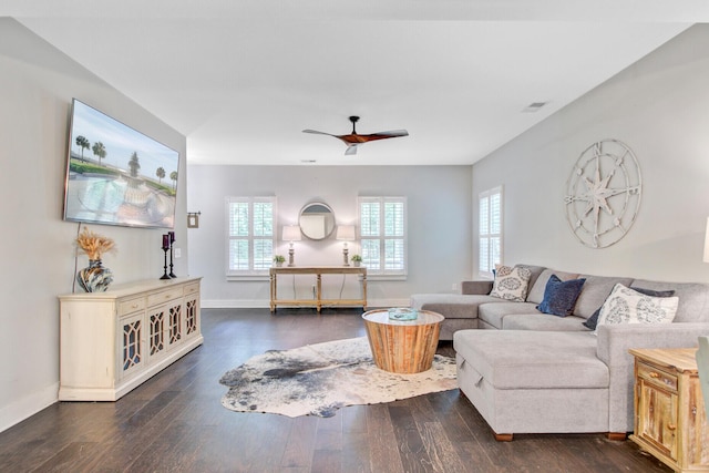 6190 Button Bush Dr, Ravenel, SC 29470 - living room with healthy amount of natural light, wood finished floors, baseboards, and ceiling fan