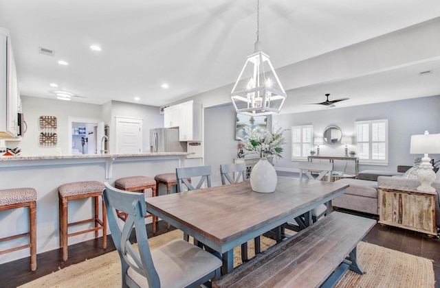 6190 Button Bush Dr, Ravenel, SC 29470 - dining area featuring a chandelier, dark wood finished floors, recessed lighting, and ceiling fan