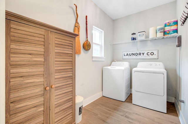 6190 Button Bush Dr, Ravenel, SC 29470 - laundry room featuring washing machine and dryer, wood finished floors, and baseboards