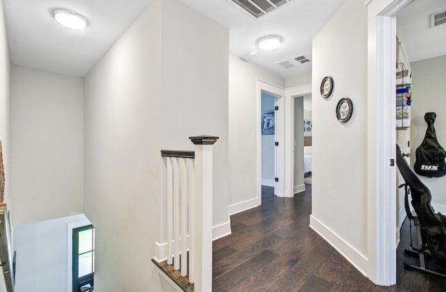 6190 Button Bush Dr, Ravenel, SC 29470 - corridor with dark wood-style floors, an upstairs landing, and baseboards