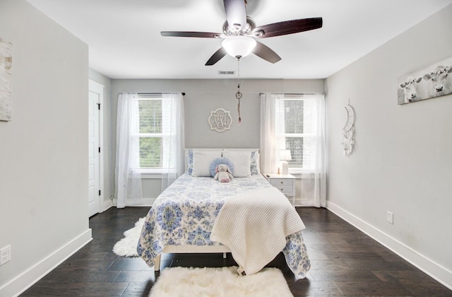 6190 Button Bush Dr, Ravenel, SC 29470 - bedroom with baseboards, dark wood-style floors, and ceiling fan